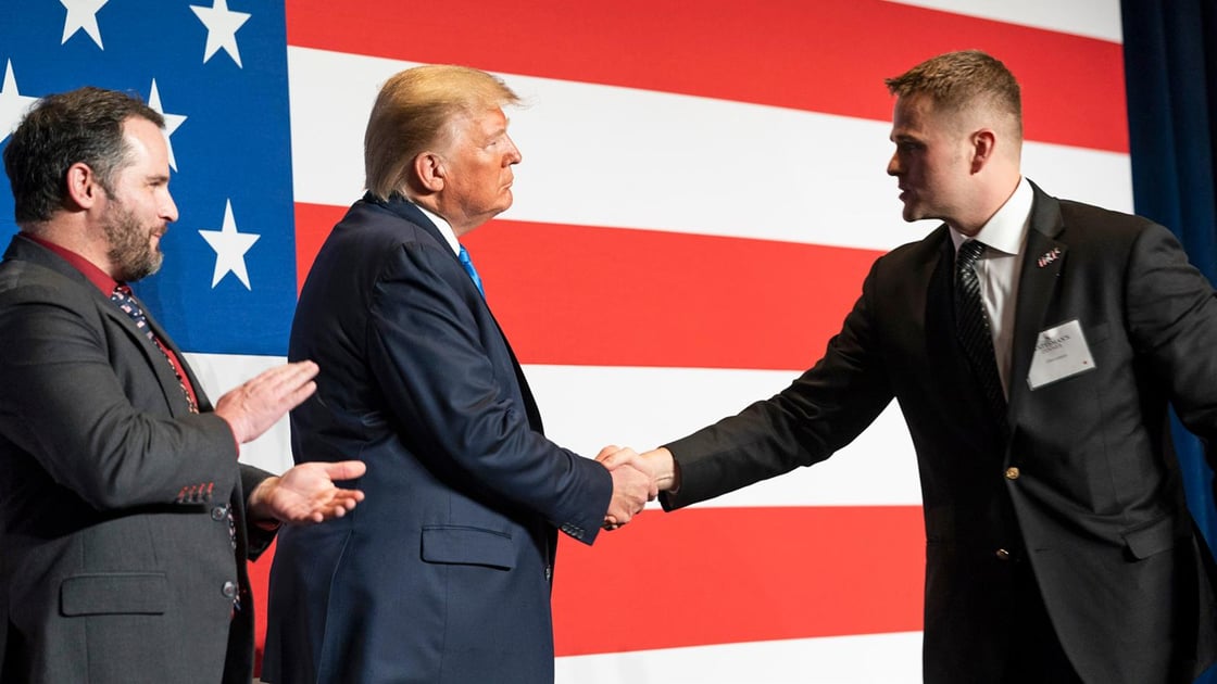 President Trump greets First Lieutenant Clint Lorance before speaking at a Florida Republican Party event