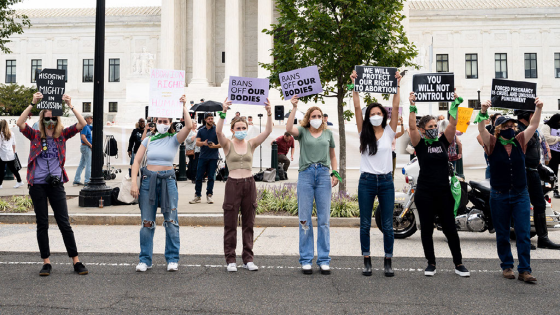 Pro-life and pro-choice protesters in front of the Supreme Court