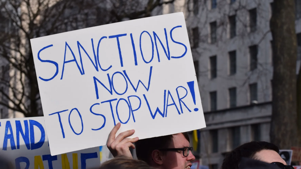 Protester advocating for sanctions to stop the Ukraine war