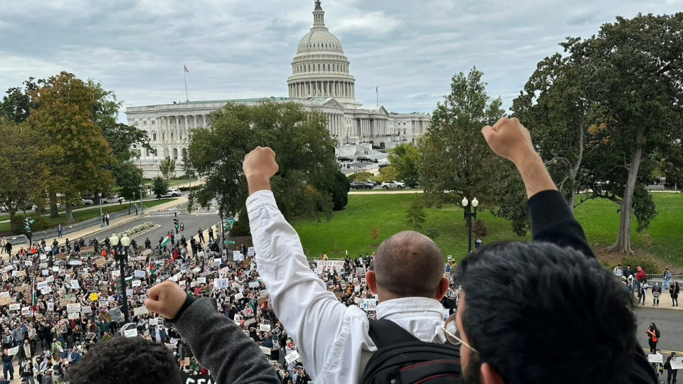 Protesters calling for a cease fire and an end to the Israel-Gaza war demonstrate at the Cannon House Office Building in Washington D.C.