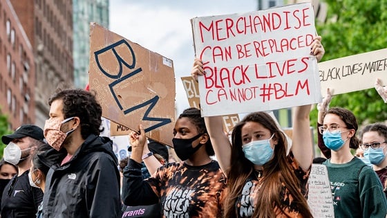 Protesters rally in response to deaths of George Floyd and against police brutality and racism in Boston.