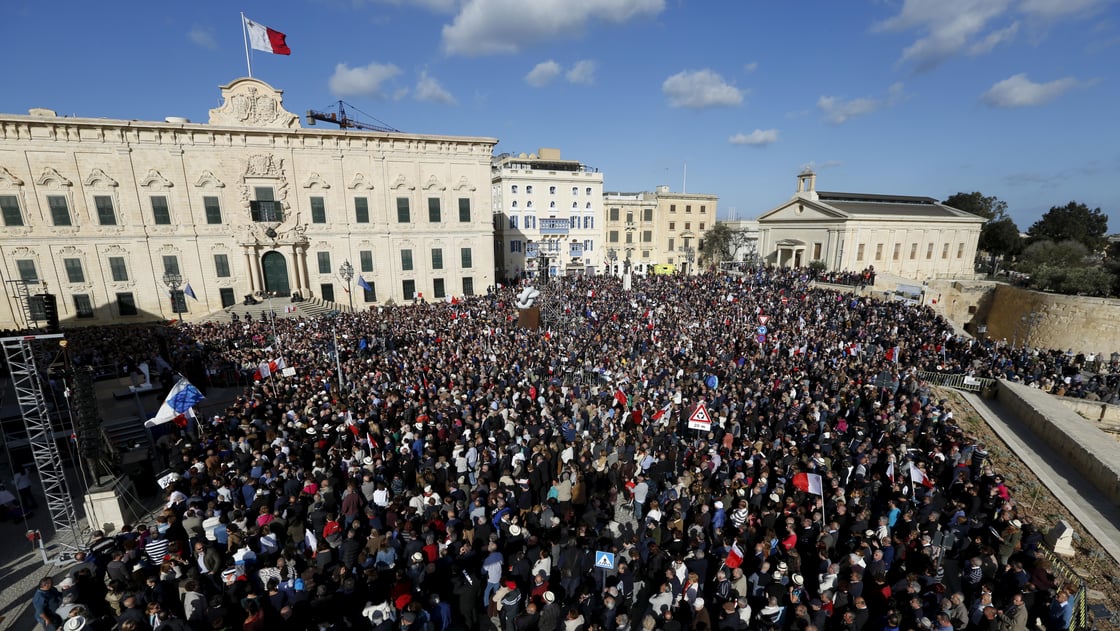 Protesters take part in a demonstration calling on Maltese Prime Minister Joseph Muscat to resign after two members of his government were named in the Panama Papers