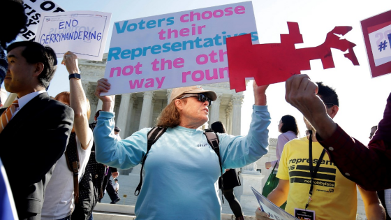 Protestors against gerrymanders gather outside of the Supreme Court