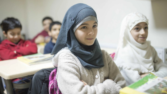 Refugee students attend school