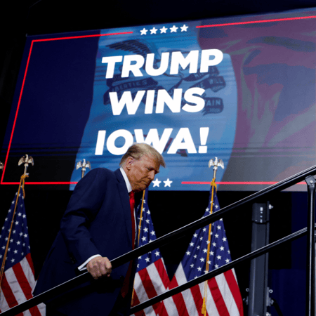 Republican presidential candidate and former U.S. President Donald Trump takes the stage during his Iowa caucus night watch party in Des Moines, Iowa