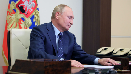 Russian President Vladimir Putin attends a meeting with members of the Security Council via a video link