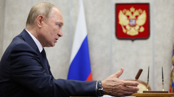 Russian President Vladimir Putin attends a meeting with the governor of the Novgorod region Andrei Nikitin