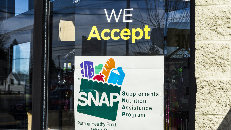 SNAP sign on a grocery store window