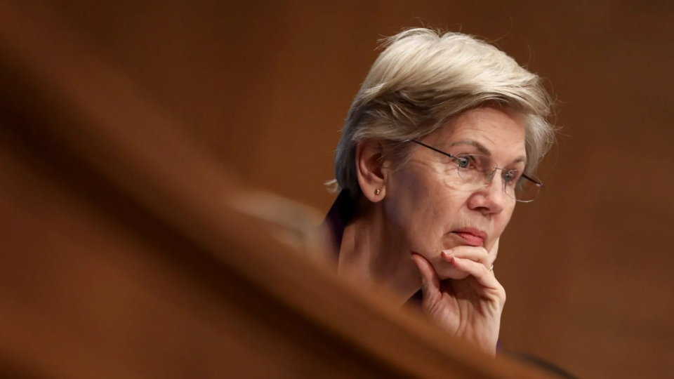 Senator Elizabeth Warren listens during a Senate Banking, Housing and Urban Affairs Committee hearing on Capitol Hill