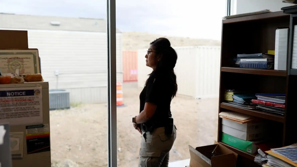 Sgt. Kathleen Lucero poses for a picture inside her office at the Isleta Police Department in Isleta Pueblo