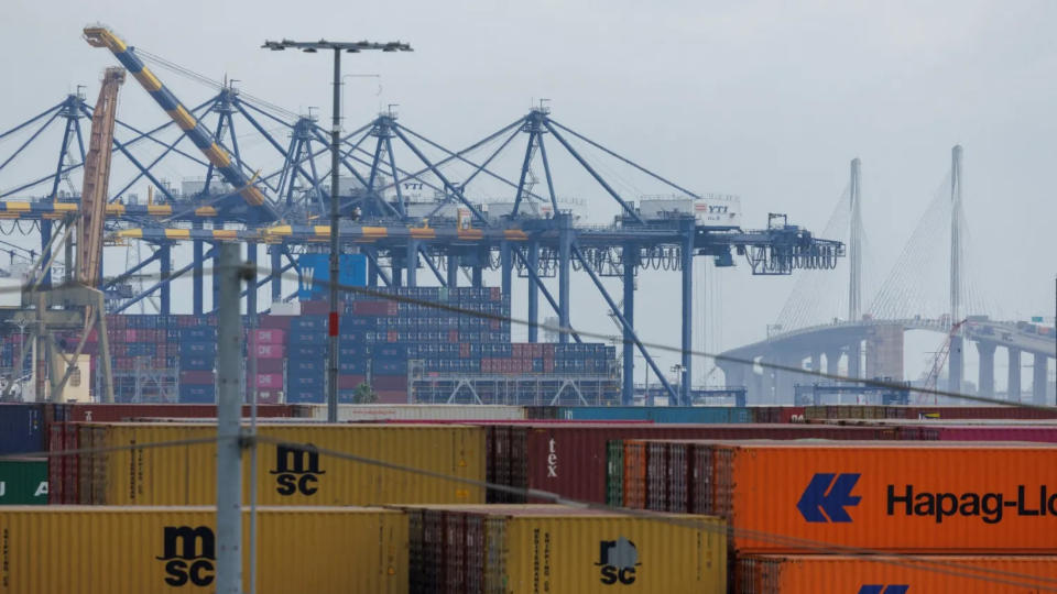 Shipping containers are shown at the Terminal 1 Container Terminal at the Port of Los Angeles in Wilmington, California