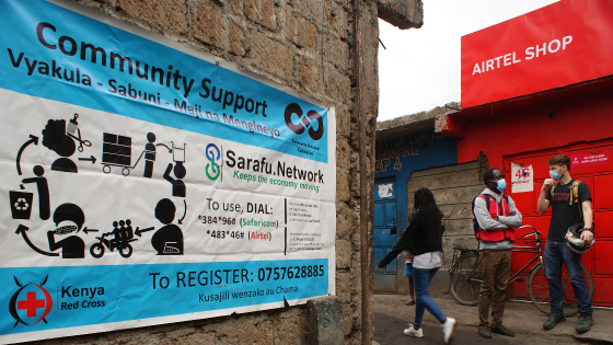 Signage for Sarafu on the streets of Mukuru Kayiaba slum in Nairobi