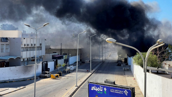 Smoke rises in the sky following clashes in Tripoli