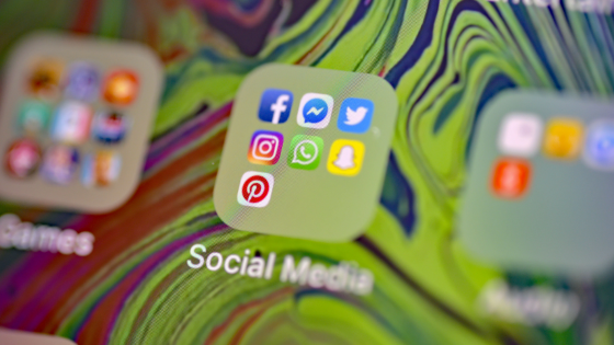 Social media app logos displayed on smartphone