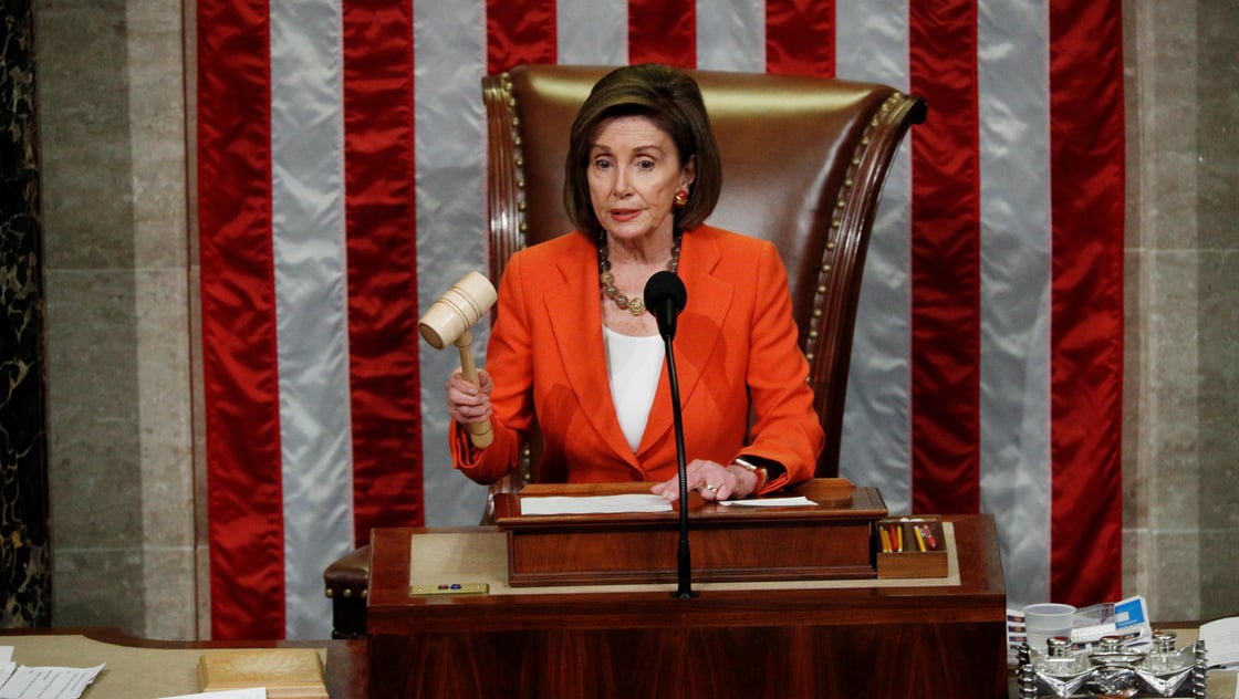 Speaker Nancy Pelosi bangs the gavel on the House resolution to formalize impeachment proceedings