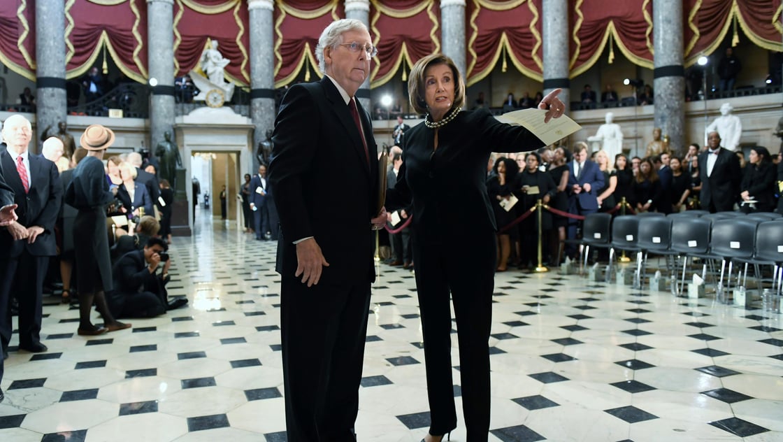 Speaker of the House Nancy Pelosi and Senate Majority Leader Mitch McConnell speak before a memorial ceremony for U.S. Rep. Elijah Cummings