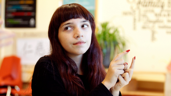 Student Lilly Fish works on her signing skills during sign language class at the Pride School in Atlanta