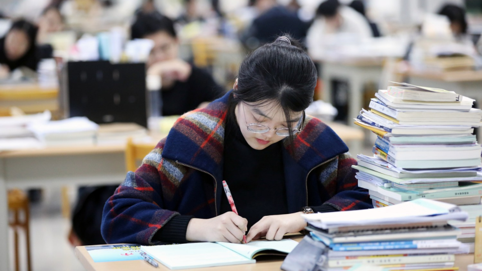 Students participating in the 2020 Postgraduate Admission Test, which is also known as National Postgraduate Entrance Examination, study at the library of the Northwest University, Xi’an city, northwest China’s Sh