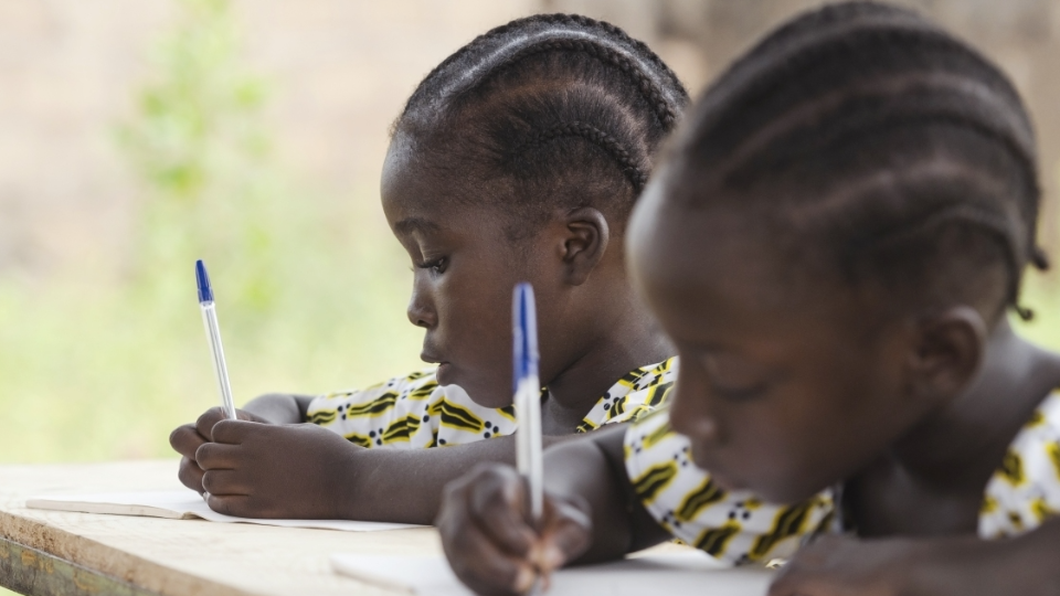 Students writing in Mali.