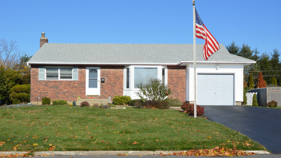 Suburban house with U.S. flag