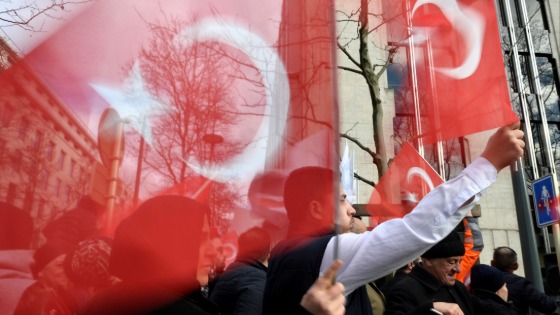 Supporters of Turkish President Tayyip Erdogan wave national flags