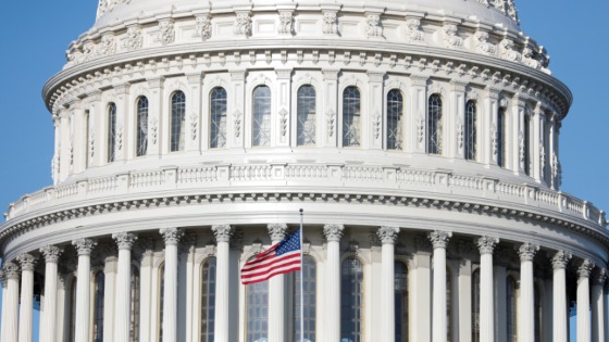 The American Flag flies at the U.S. Capitol Building