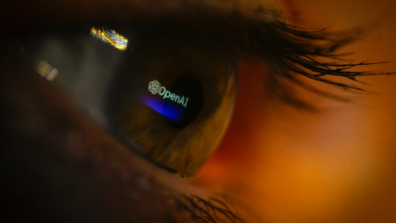 The OpenAI logo is seen reflected in an eye in this photo illustration in Warsaw