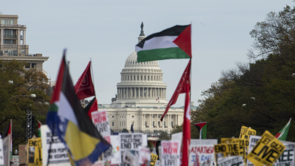 The US Capitol is seen in the distance as thousands of anti-Israel protestors fill Freedom Plaza and the surrounding streets for rally and march calling for an end to the Israel - Hamas war. 