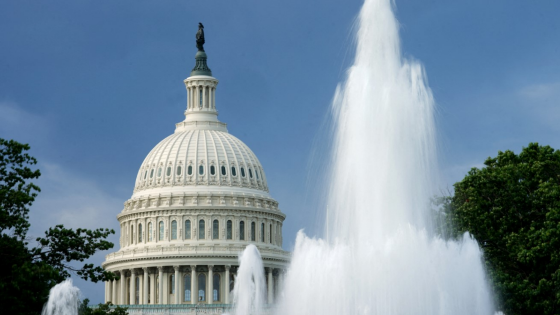 The dome of the U.S. Capitol is seen beyond a fountain