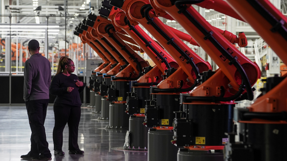 The electric vehicle battery tray assembly line is seen at the opening of the Battery Factory for the Mercedes-Benz plant in Alabama