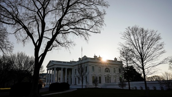 The sun rises over the White House in Washington