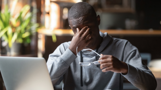 Tired man in front of laptop (2)