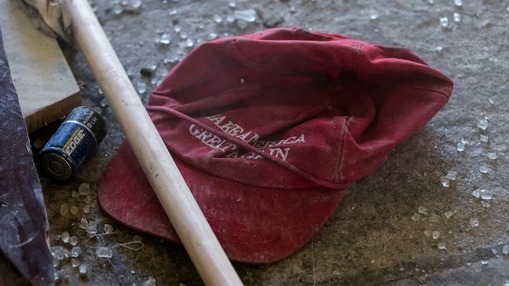 Trump campaign cap sits in the debris left behind at the West Terrace entrance of the Capitol