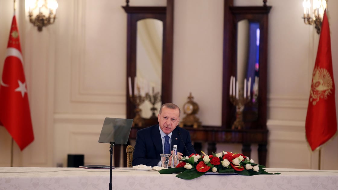 Turkish President Tayyip Erdogan chairs a meeting with ministers, bankers and business leaders to discuss dealing with coronavirus