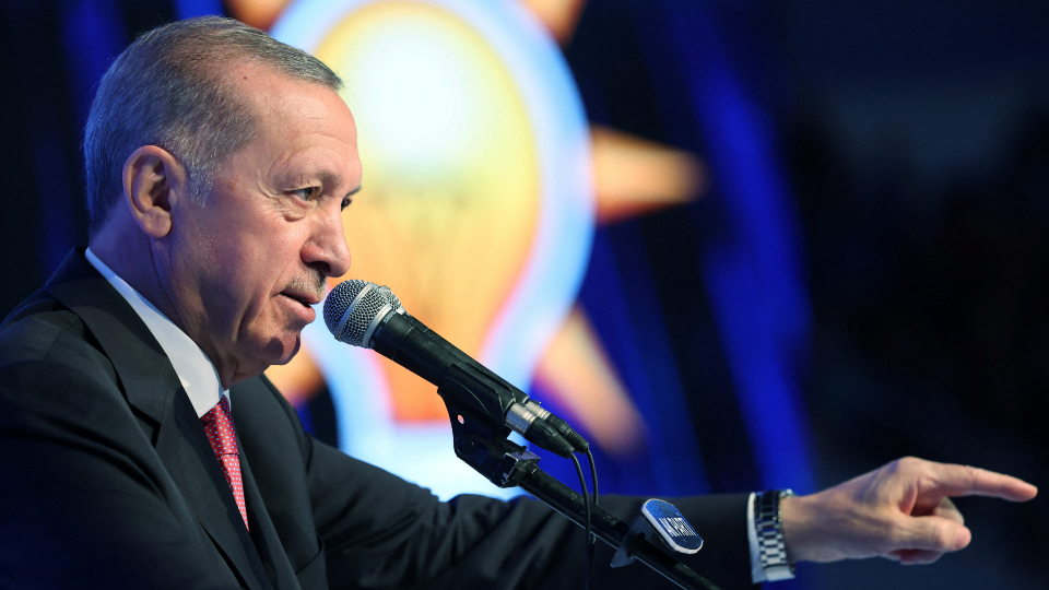 Turkish President Tayyip Erdogan makes a speech during a meeting of his ruling AK Party to announce the partys election manifesto.