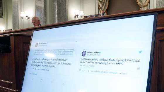 Tweets from Donald Trump are shown during a Senate committee hearing