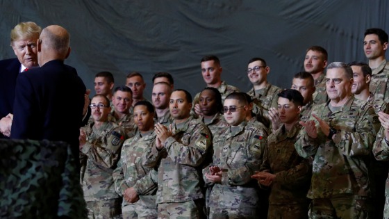 U.S. Military Joint Chief of Staff Mark Miley looks on as U.S. President Donald Trump shakes hands with Afghanistan President Ashraf Ghani