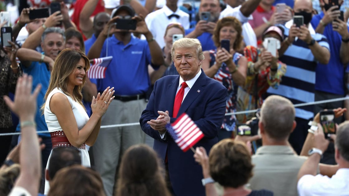 U.S. President Donald Trump and First Lady Melania Trump greet guests at the 2020 Salute to America on the South Lawn of the White House