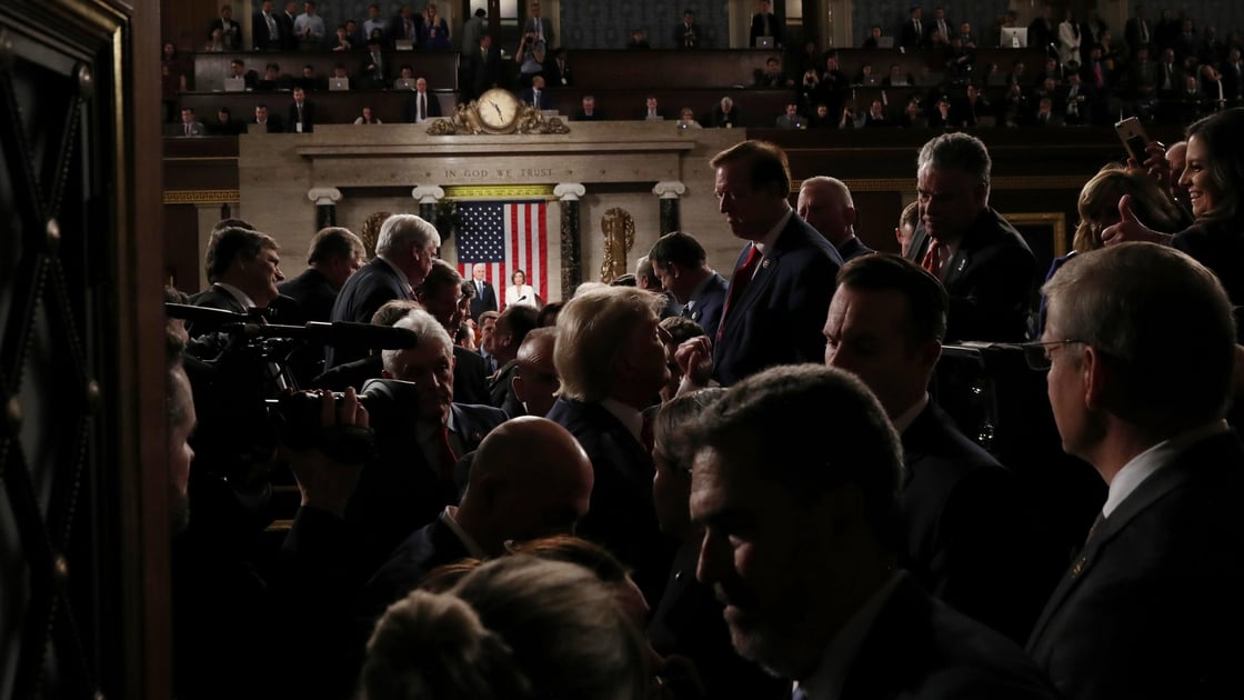 U.S. President Donald Trump departs at the conclusion of his State of the Union address in 2020