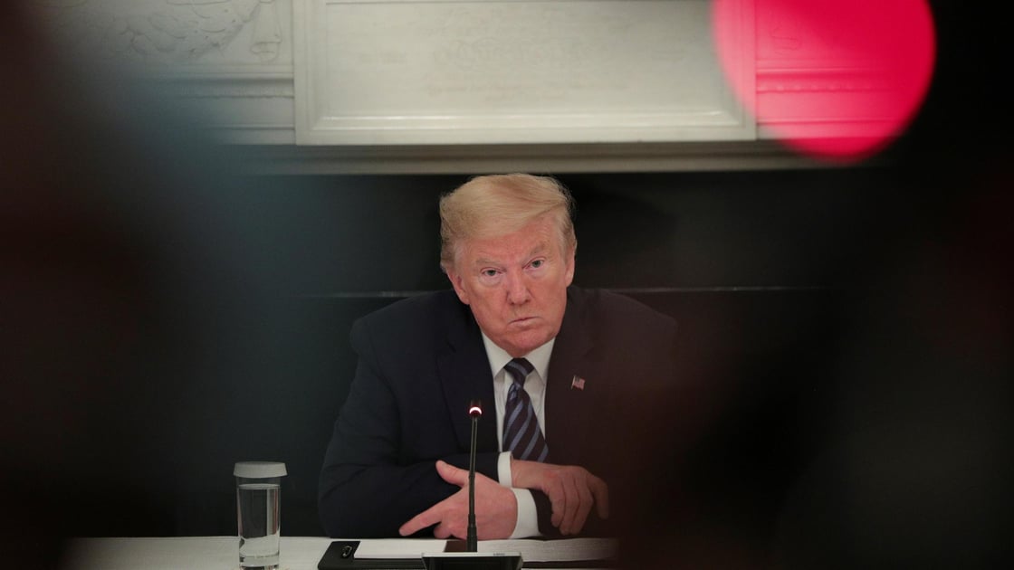 U.S. President Donald Trump listens during a meeting with Republican members of Congress in the State Dining Room at the White House in Washington