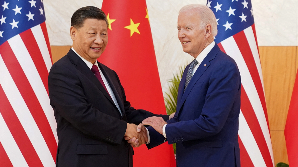 U.S. President Joe Biden shakes hands with Chinese President Xi Jinping as they meet on the sidelines of the G20 leader summit.