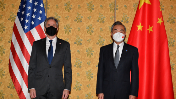 U.S. Secretary of State Antony Blinken and Chinese Foreign Minister Wang Yi pose for a picture before their meeting on the sidelines of the G20 summit