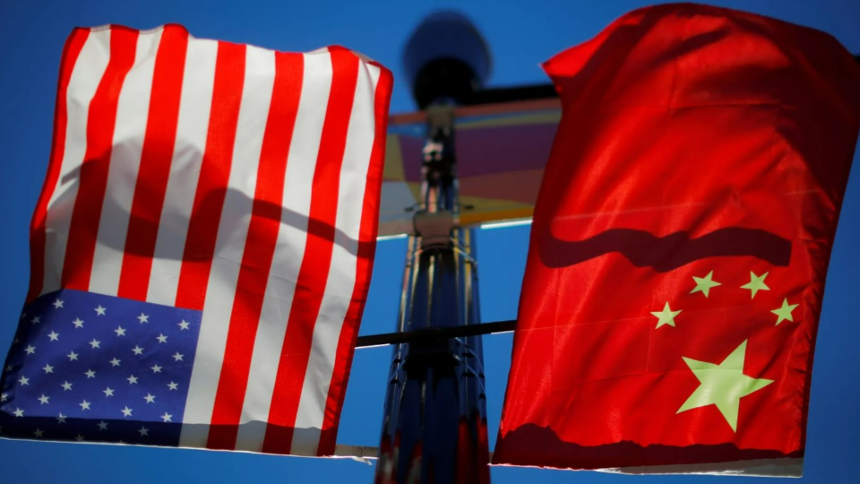 U.S. and China flags on a lightpole