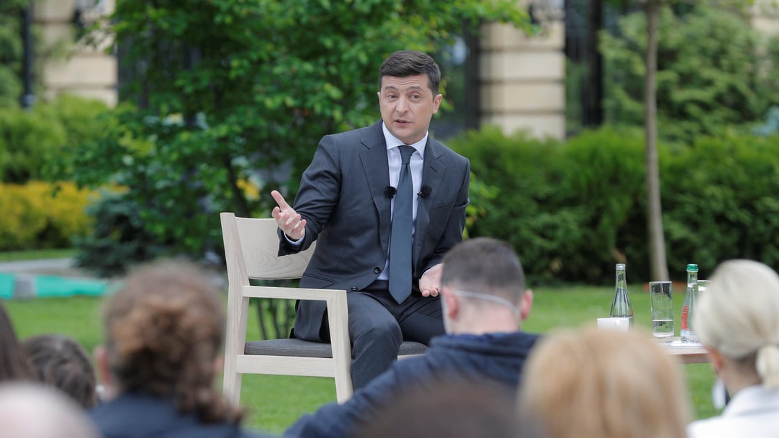 Ukrainian President Volodymyr Zelenskiy speaks during a news conference one year after his inauguration