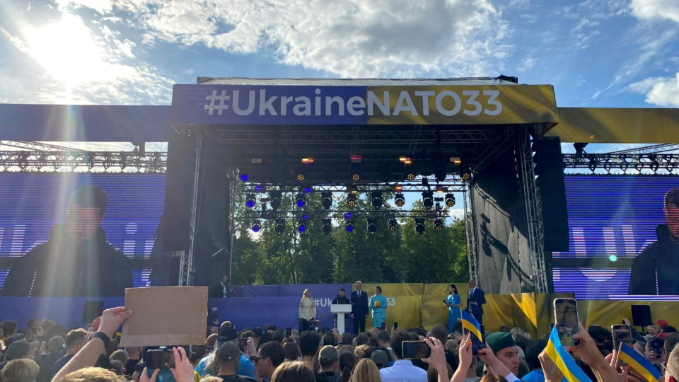 Ukrainian President Volodymyr Zelensky speaks at an outside venue at the 2023 NATO summit