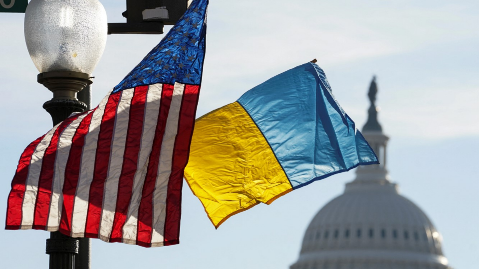 Ukrainian and U.S. flags are flown along Pennsylvania Avenue leading to the U.S. Capitol