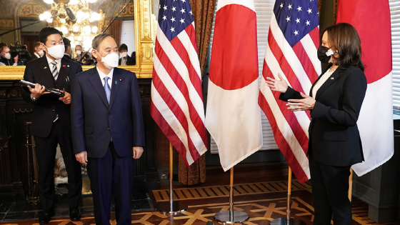 United States Vice President Kamala Harris greets Prime Minister Yoshihide Suga of Japan