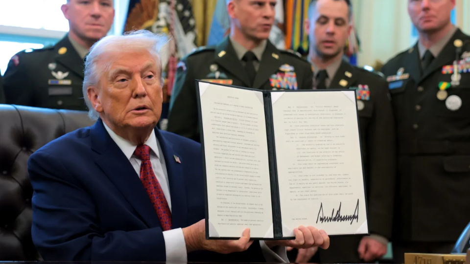 U.S. President Donald Trump signs an executive order classifying fentanyl as a "weapon of mass destruction," during a ceremony for the presentation of the Mexican Border Defense Medal in the Oval Office of the White House on December 15, 2025 in Washington, DC. (Anna Moneymaker/Getty Images)
