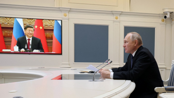 Vladimir Putin holds talks with Xi Jinping via a video link from Moscow