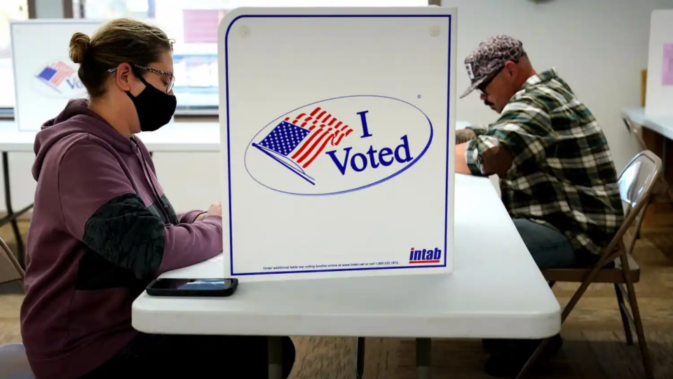 Voters fill out their ballots for the 2024 U.S. presidential election on Election Day in Fort Supply, Oklahoma